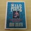 Wild People: Travels with Borneo's Head-hunters.